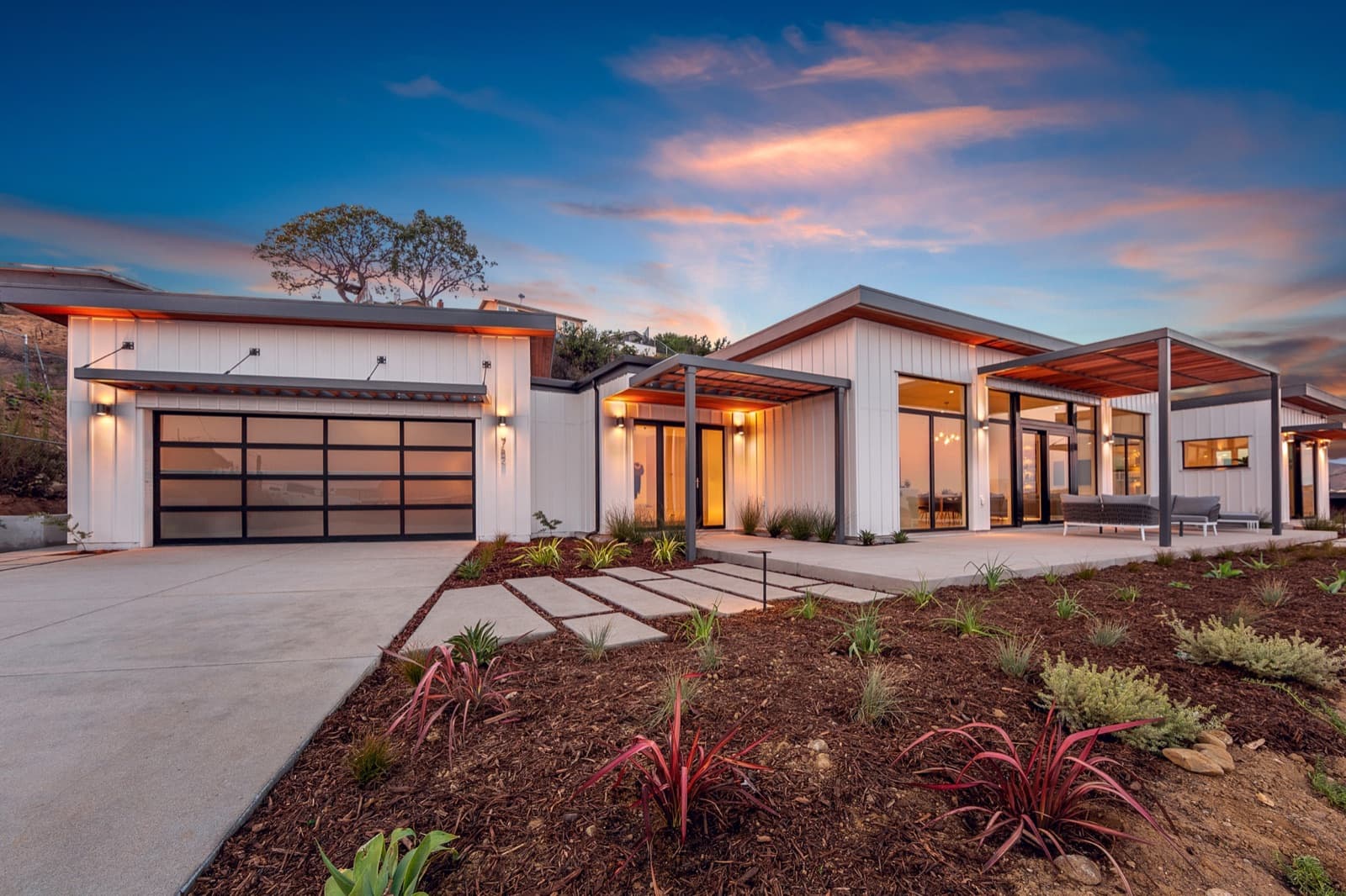 A Dvele steel modular home at dusk in Ventura, California (a full-size home, not an ADU)