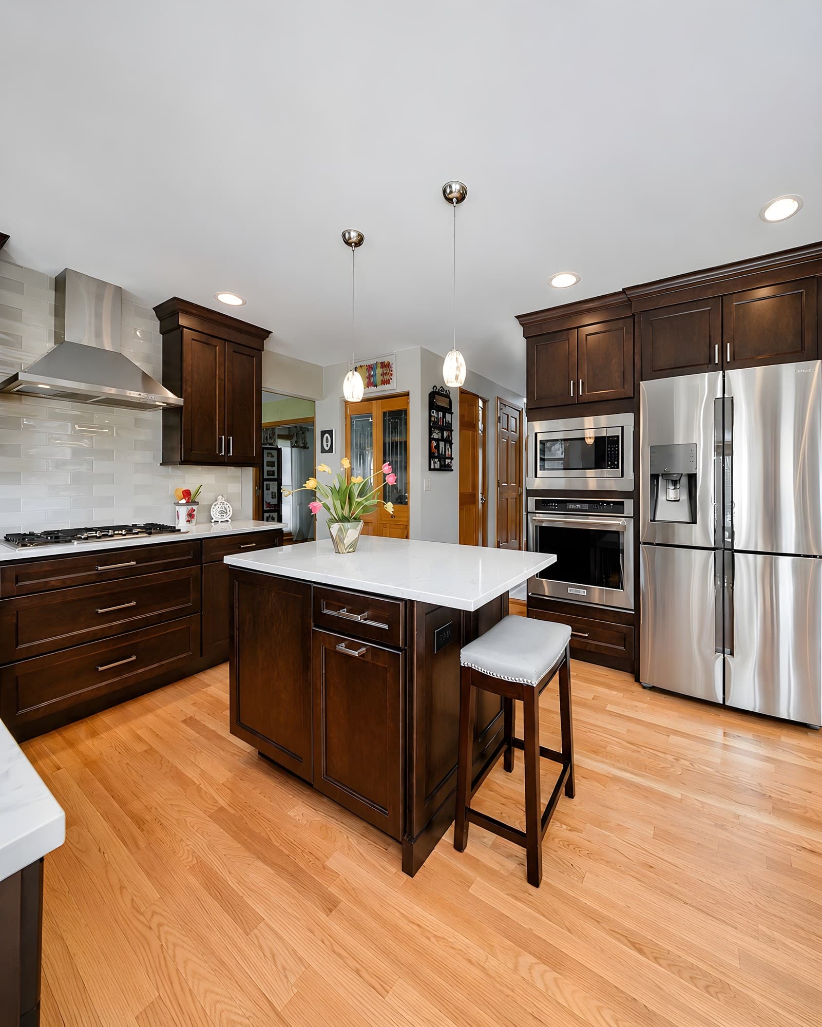 This kitchen brings classic depth into a cleaner, more elevated frame