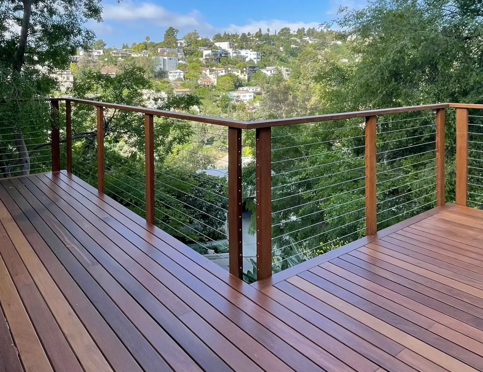 Hardwood hillside deck with cable railing