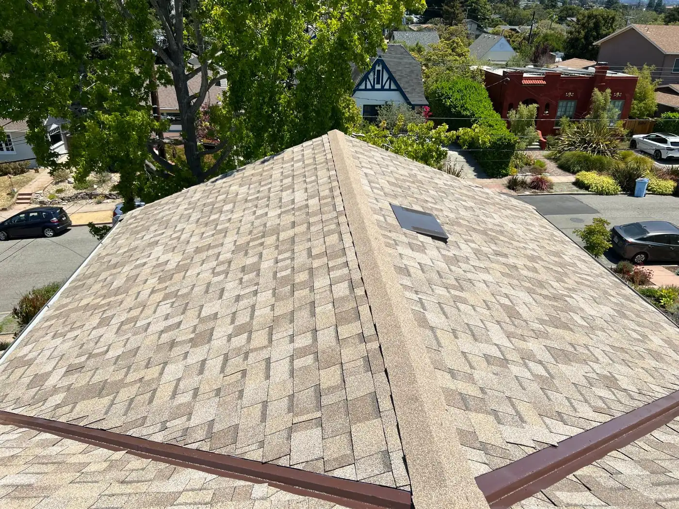 Asphalt shingle hip roof with new ridge cap