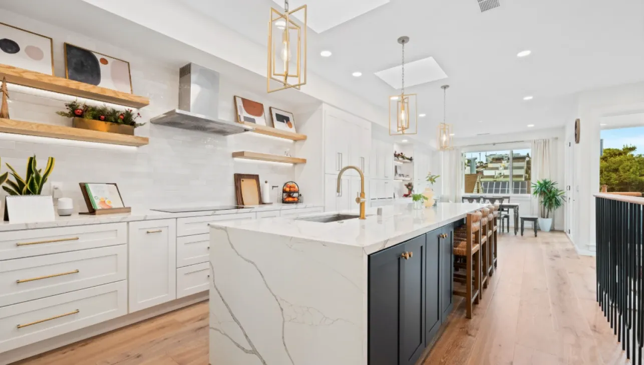 Kitchen with a waterfall island in a home with a two-story addition, Miraloma, San Francisco