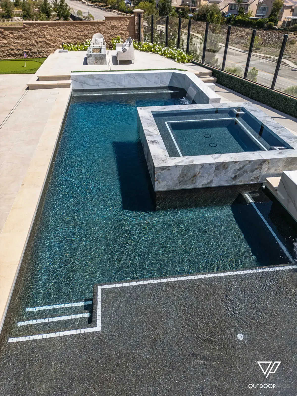 Pool and floating spa with marble coping, Porter Ranch