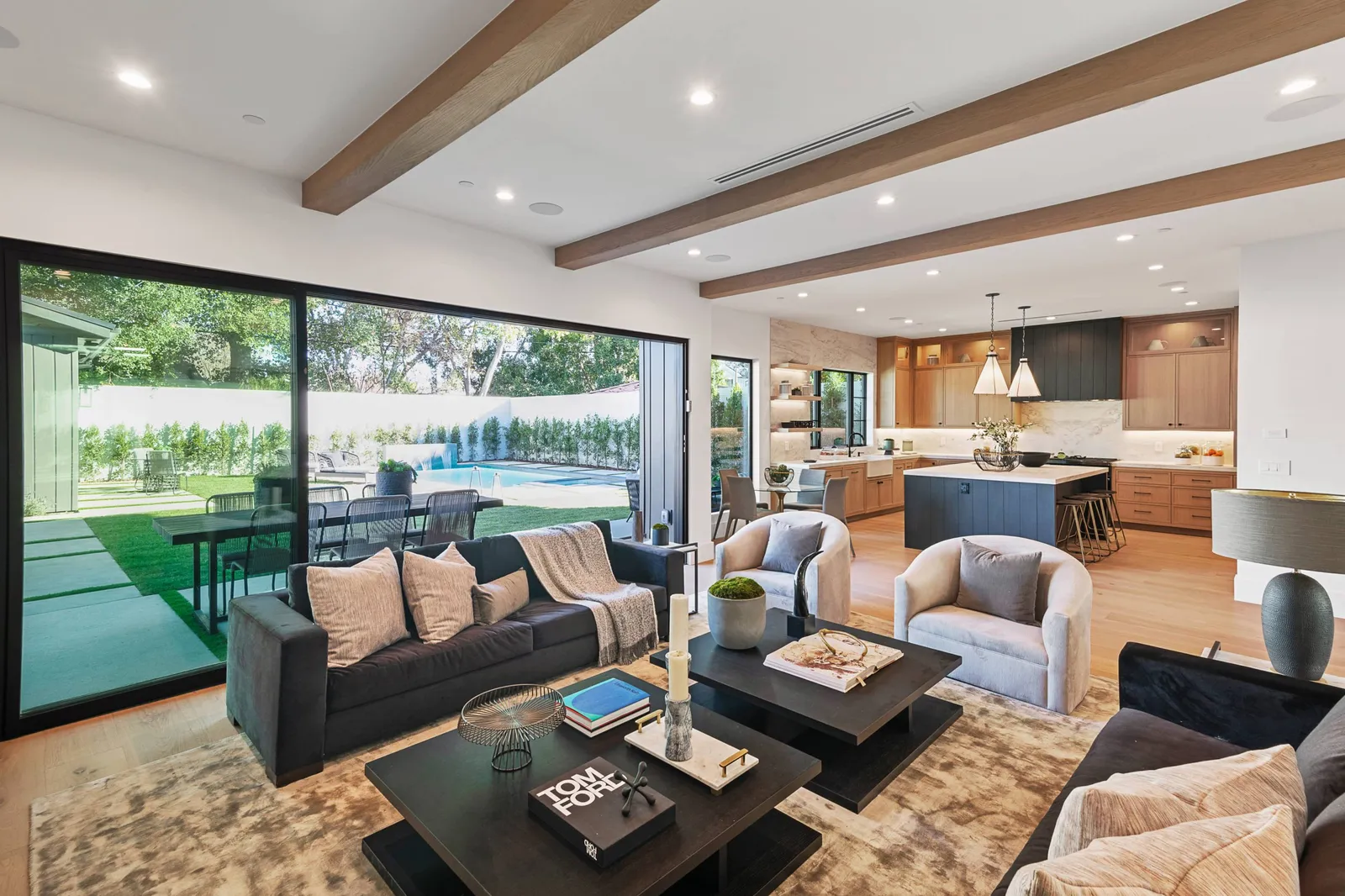 Family room opening to the backyard through sliding doors