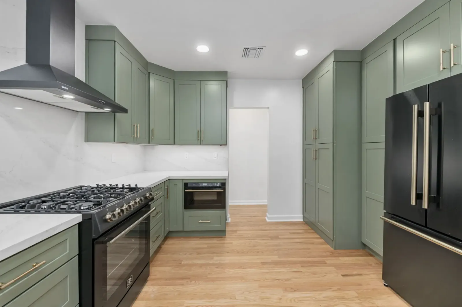 Kitchen with sage green cabinets, Martel Ave full house remodel