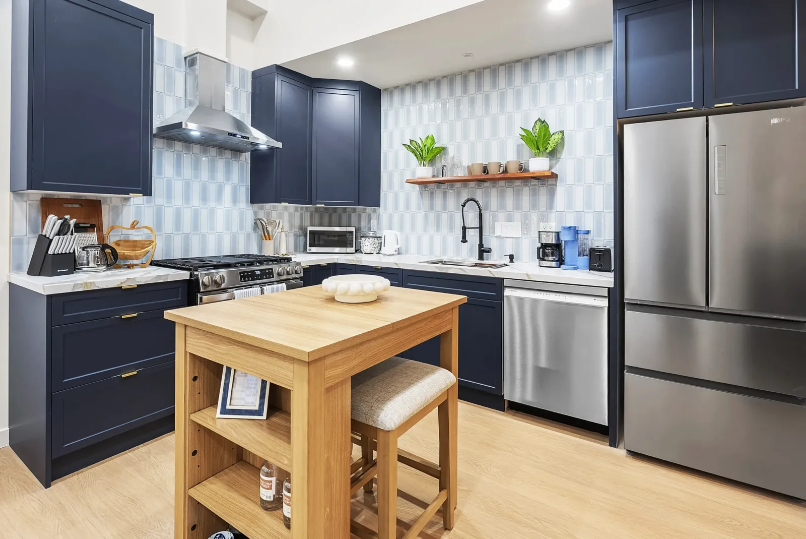 ADU kitchen with navy cabinets, Los Angeles