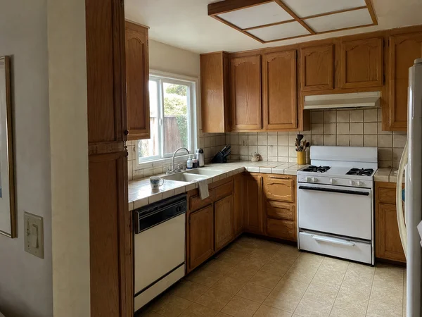 Before: dated 1990s LA kitchen
