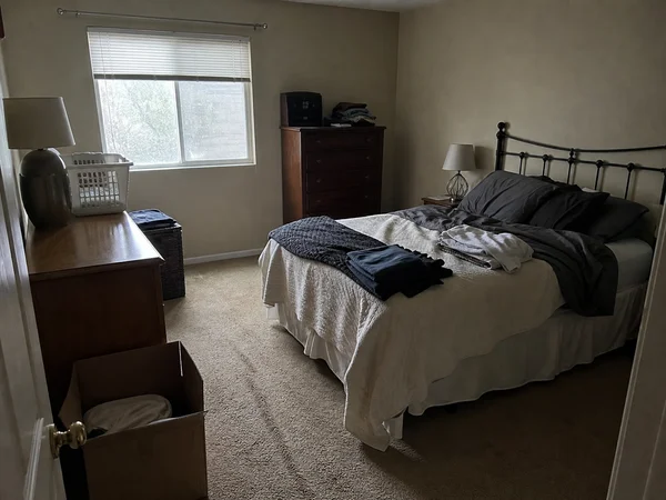 Before: cluttered Portland bedroom